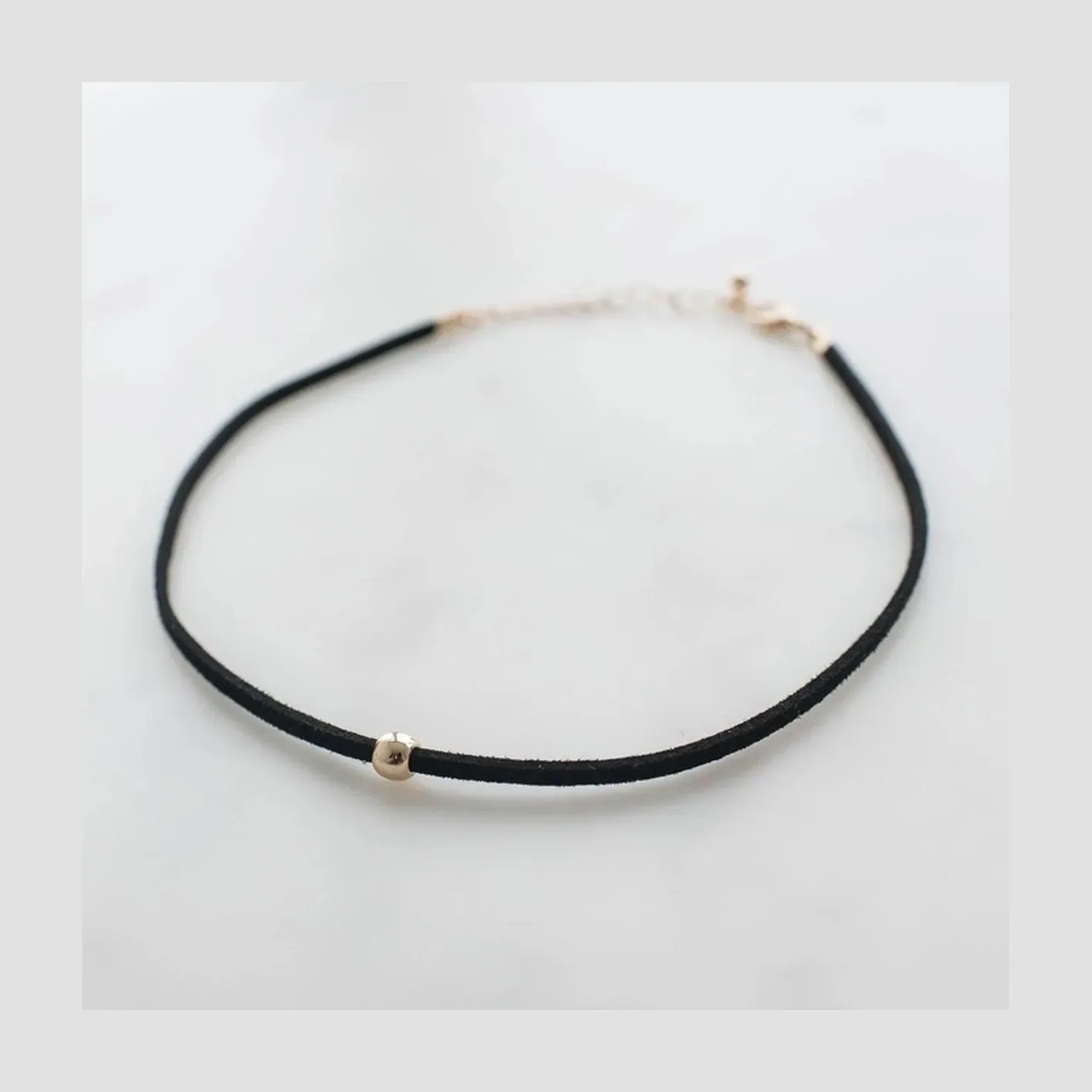 Choker doble con aro dorado
